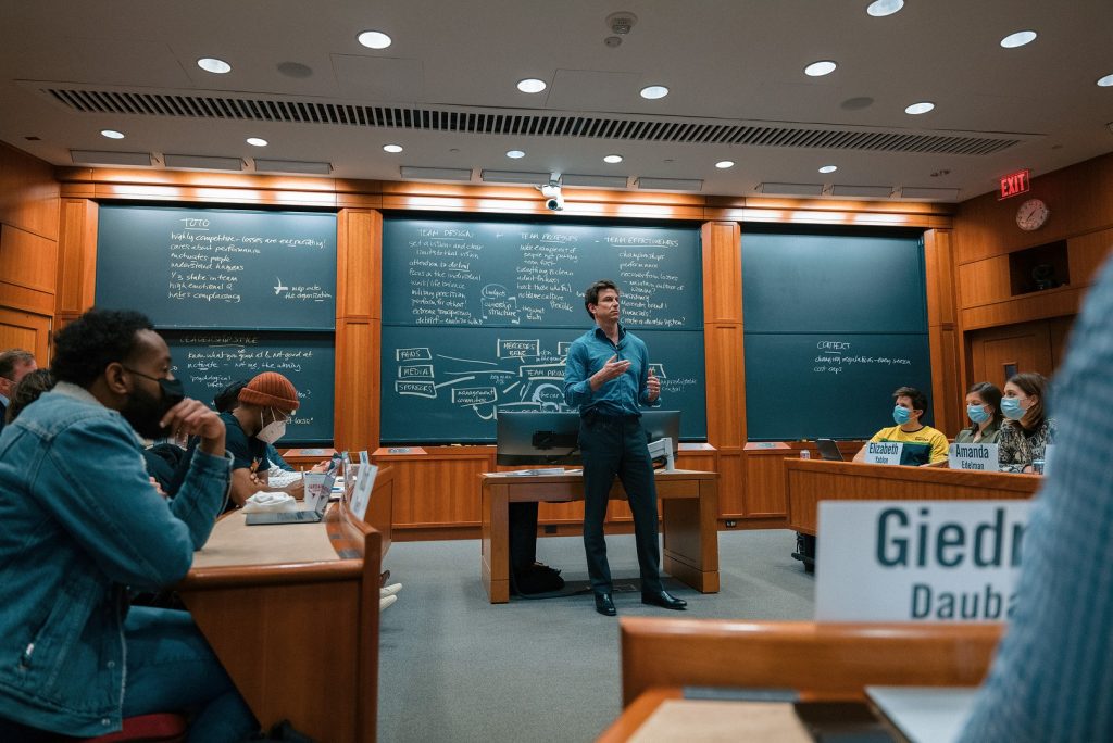 Toto Wolff delivering a lecture to a room of students. 